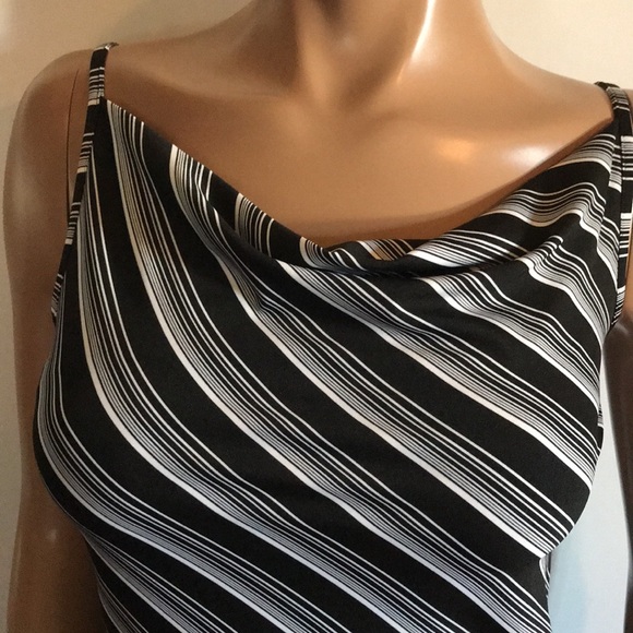 Black and white top. Tie at the hip for looks. Size small - Picture 3 of 4